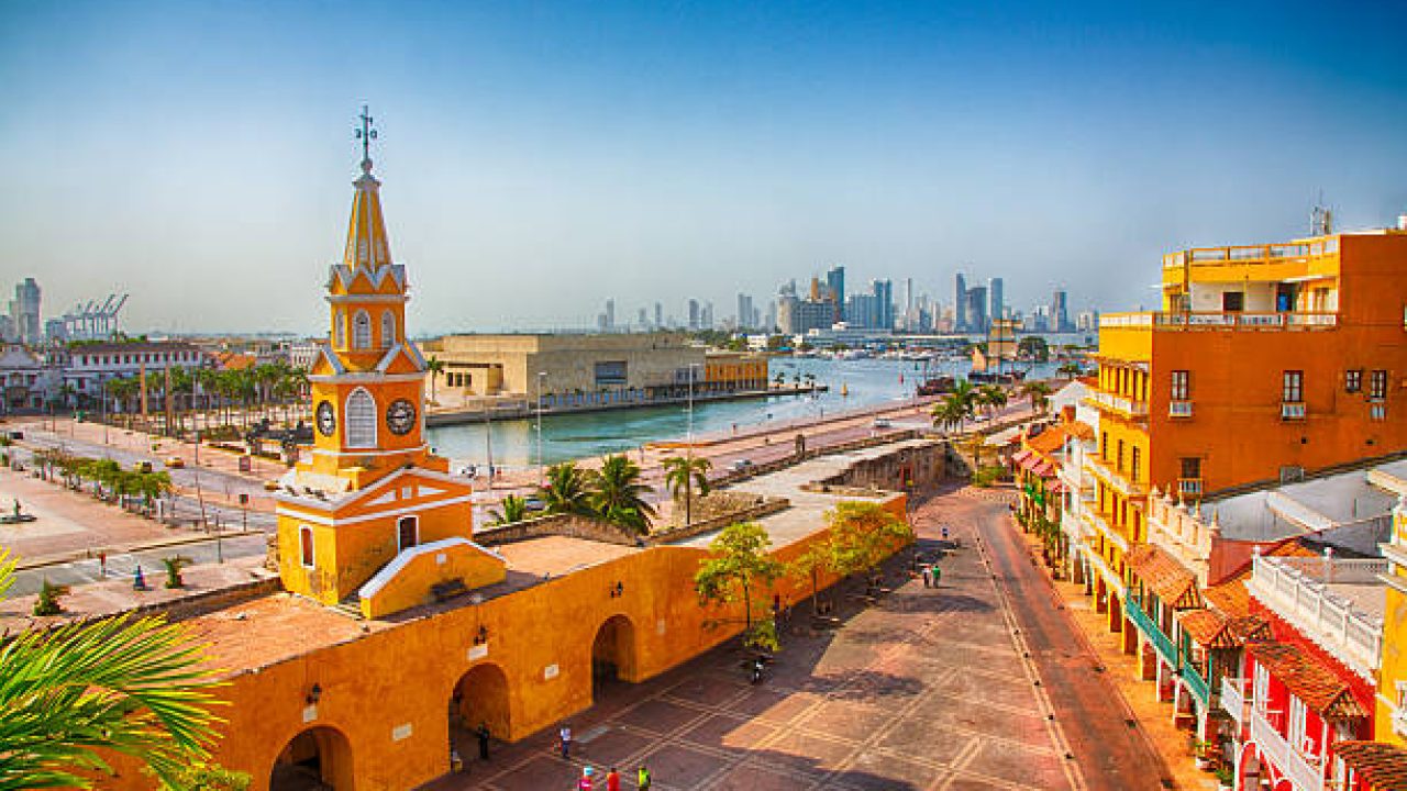 Cartagena, Colombia - February 23, 2014: Workers start their day near the Clock Tower Gate in Cartagena's old city.